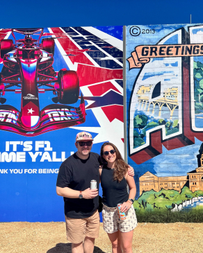 Carrie Tomlinson in front of a mural in Austin, TX