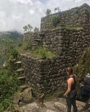 Carson Young observes a stairwell on the Inca Train in Peru
