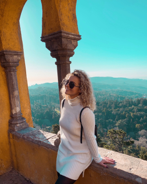 Carson Young on a balcony in Portugal