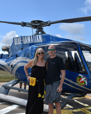 Christine Johnson in front of a helicopter in Kauai
