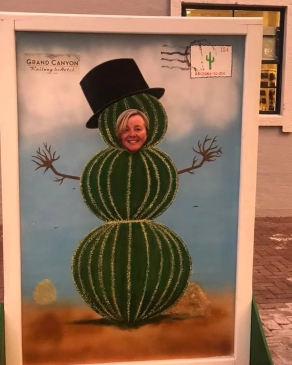 Claire Wingate poses as a cactus snowman in a photo stand-in at the Grand Canyon Railway & Hotel
