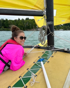 Ivy Vaughn on a day-sailing catamaran in Michigan
