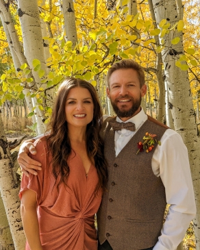 Kelli Chiri among aspen trees showing off their fall colors in Colorado