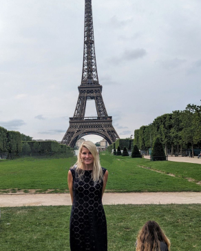 Lauren Bourgoing in front of the Eiffel Tower in Paris, France