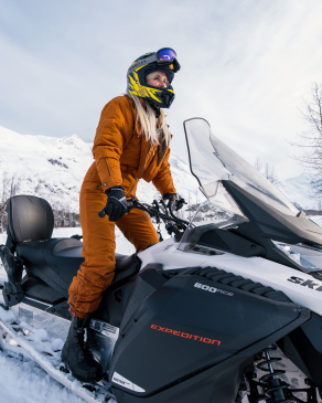 Liz Mabe on a snowmobile in Alaska
