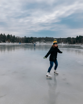 Melissa Juneau ice skating on a lake in Wisconsin