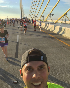 Mitch Veix running a race over the Sunshine Skyway Bridge in Tampa