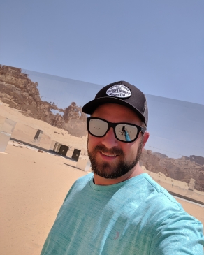 Neal Alfano in a desert landscape in Saudi Arabia