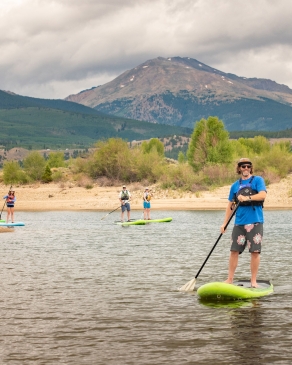 Pat Attkisson paddle boarding in Colorado