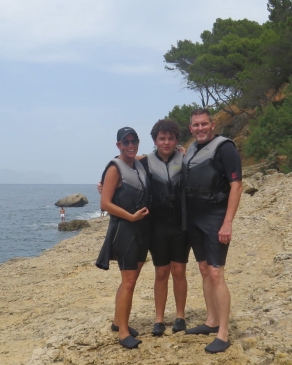Ryan Thompson on a rocky beach in Mallorca, Spain
