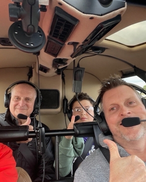 Ryan Thompson in a helicopter