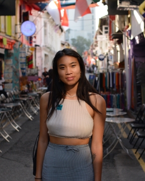 Samantha Sitt on a colorful Singapore street