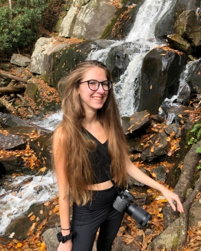 Sarah Katz next to a waterfall in the Smoky Mountains