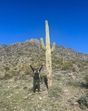 Sebrina Williams with a saguaro cactus in Phoenix, AZ