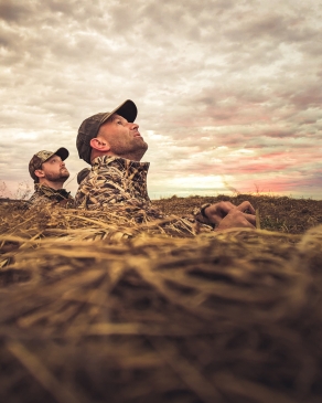 Jay Salyers in a field in camo