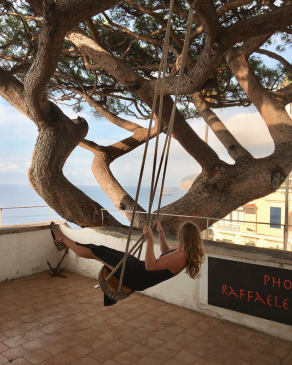 Andrea Valentini on a rope swing in Italy