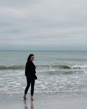 Madeleine Wiley on a beach