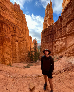 A photo of Joe in-between canyons in Utah.