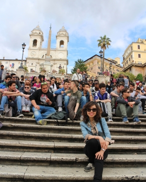 A photo of Wenjie on a crowded staircase in Rome. 