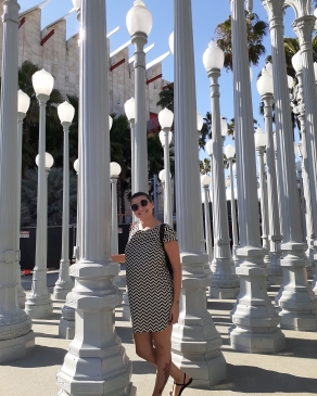 A photo of Nicole near lamp posts in LA.