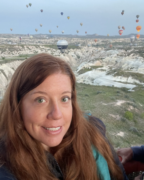 A photo of Rachel in front of hills in Turkey. 