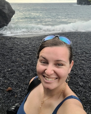 A photo of Emily on a beach in Hawaii. 