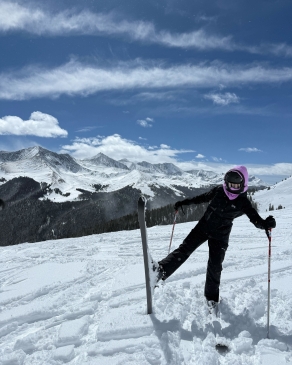 A photo of Shiann skiing. 