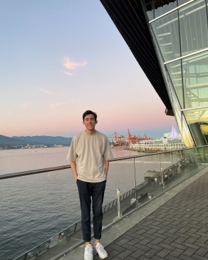 A photo of James near a walkway in Vancouver. 