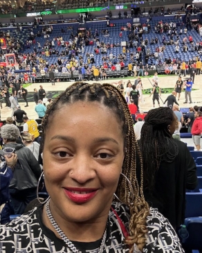 A photo of Jennifer at a basketball game in New Orleans. 
