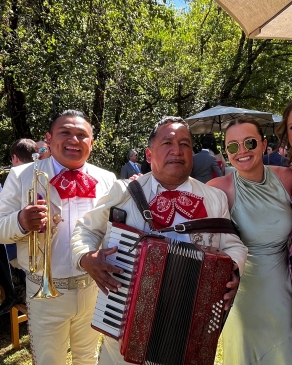 A photo of Victoria with a Mariachi band