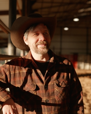 A still from a video of Dylan in a ranch. 
