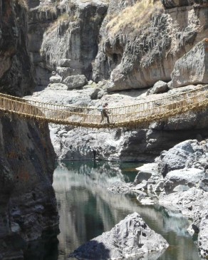 Dylan crossing a rope bridge. 