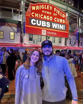 A photo of Taylor outside Wrigley Field