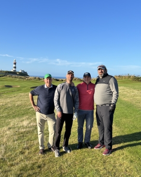 A photo of Joe golfing. 