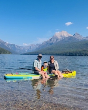 A photo of Emily on a canoe at Glacier National Park. 