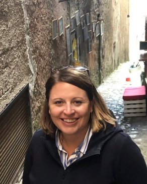 A photo of Emily down an Italian ally. 
