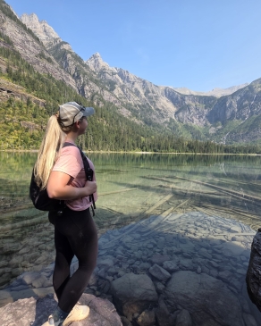 A photo of Kayla admiring nature in Montana.