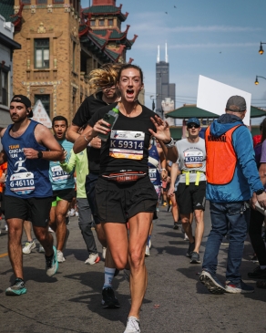 A photo of Micaela running in Chicago. 