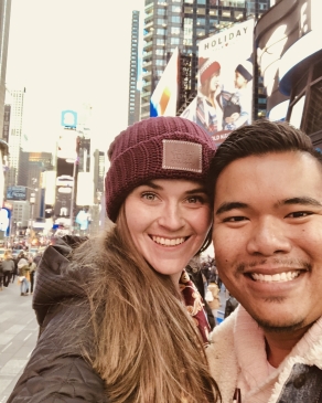 A photo of Bryan and his wife in Times Square. 