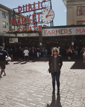 A photo of Shay outside Pike Place in Seattle. 