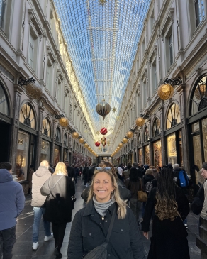 Lexie surrounded by historical buildings in Brussels. 