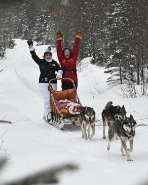 Kim being pulled by huskies in Quebec. 