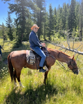 Mike on horseback in Montana. 